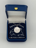 Silver Aquarius + Pisces constellation medallion necklace in gift box with silver foil zodiac card
