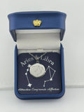 Silver Aries + Libra constellation medallion necklace in gift box with silver foil zodiac card"
