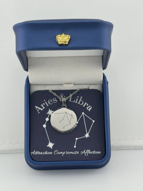 Silver Aries + Libra constellation medallion necklace in gift box with silver foil zodiac card"
