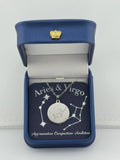 Silver Aries + Virgo constellation medallion necklace in gift box with silver foil zodiac card.
