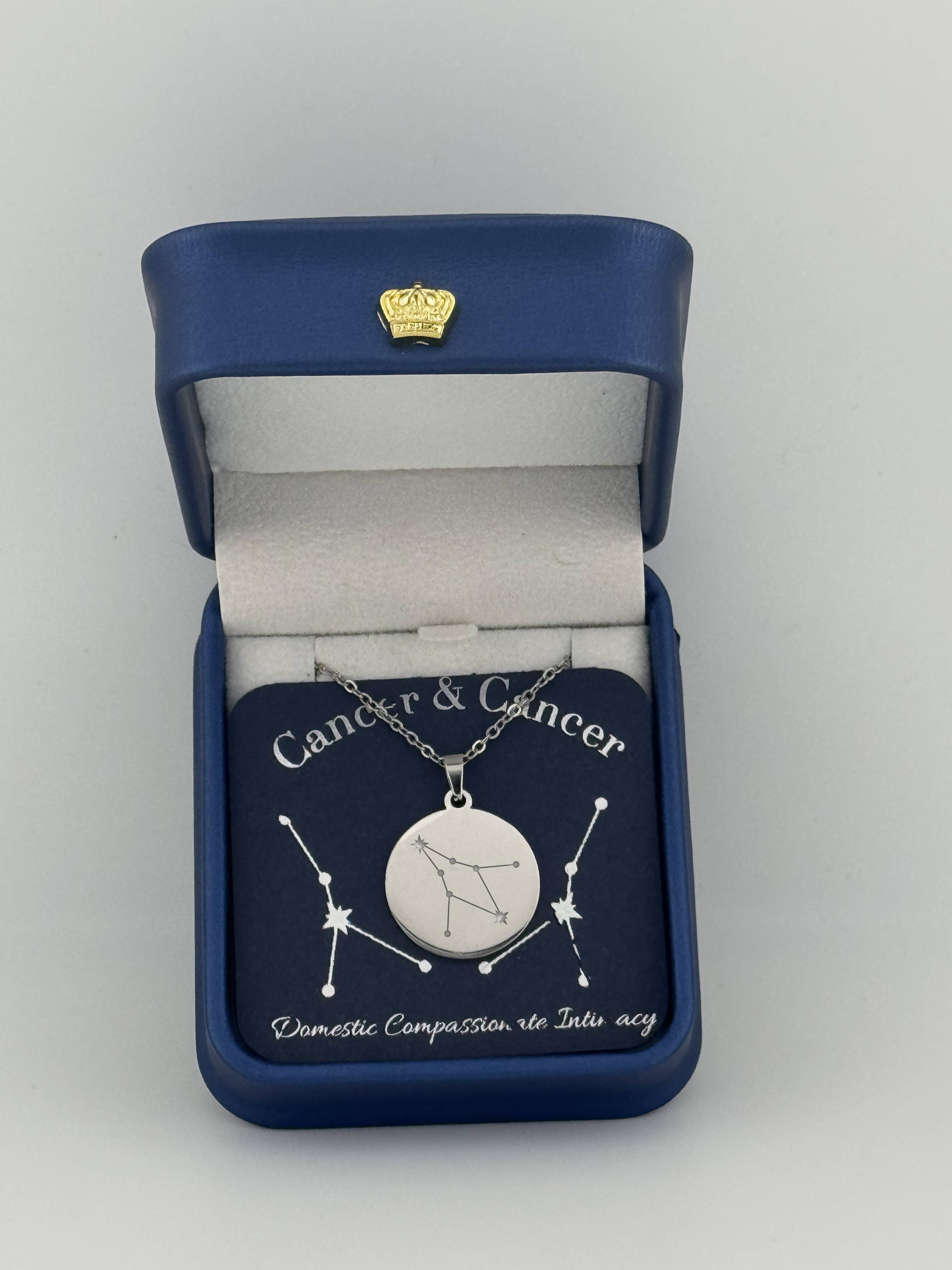 Silver Cancer + Cancer constellation medallion necklace in gift box with silver foil zodiac card
