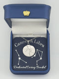 Silver Cancer and Libra constellation medallion necklace in gift box with silver foil zodiac card
