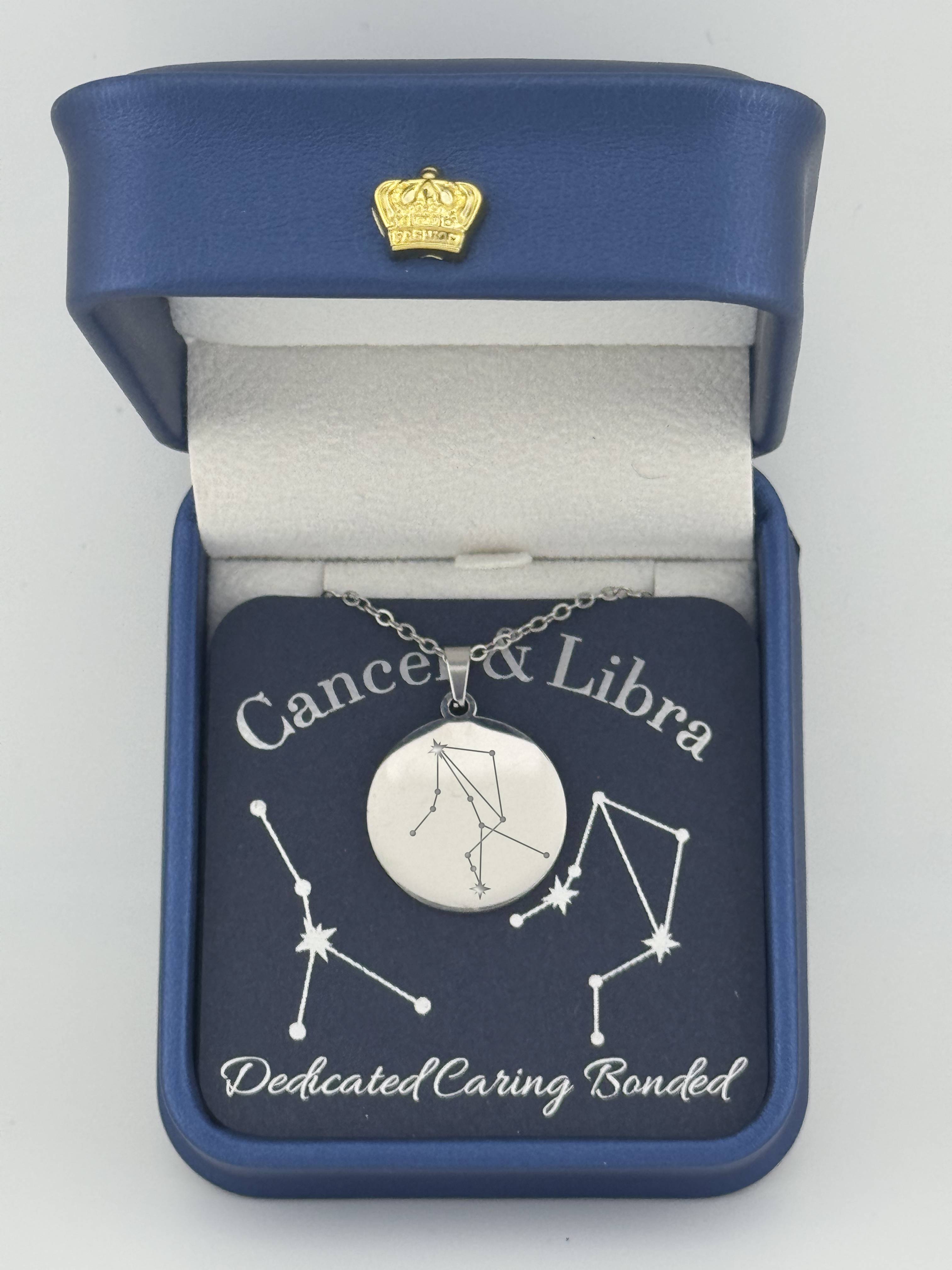 Silver Cancer and Libra constellation medallion necklace in gift box with silver foil zodiac card
