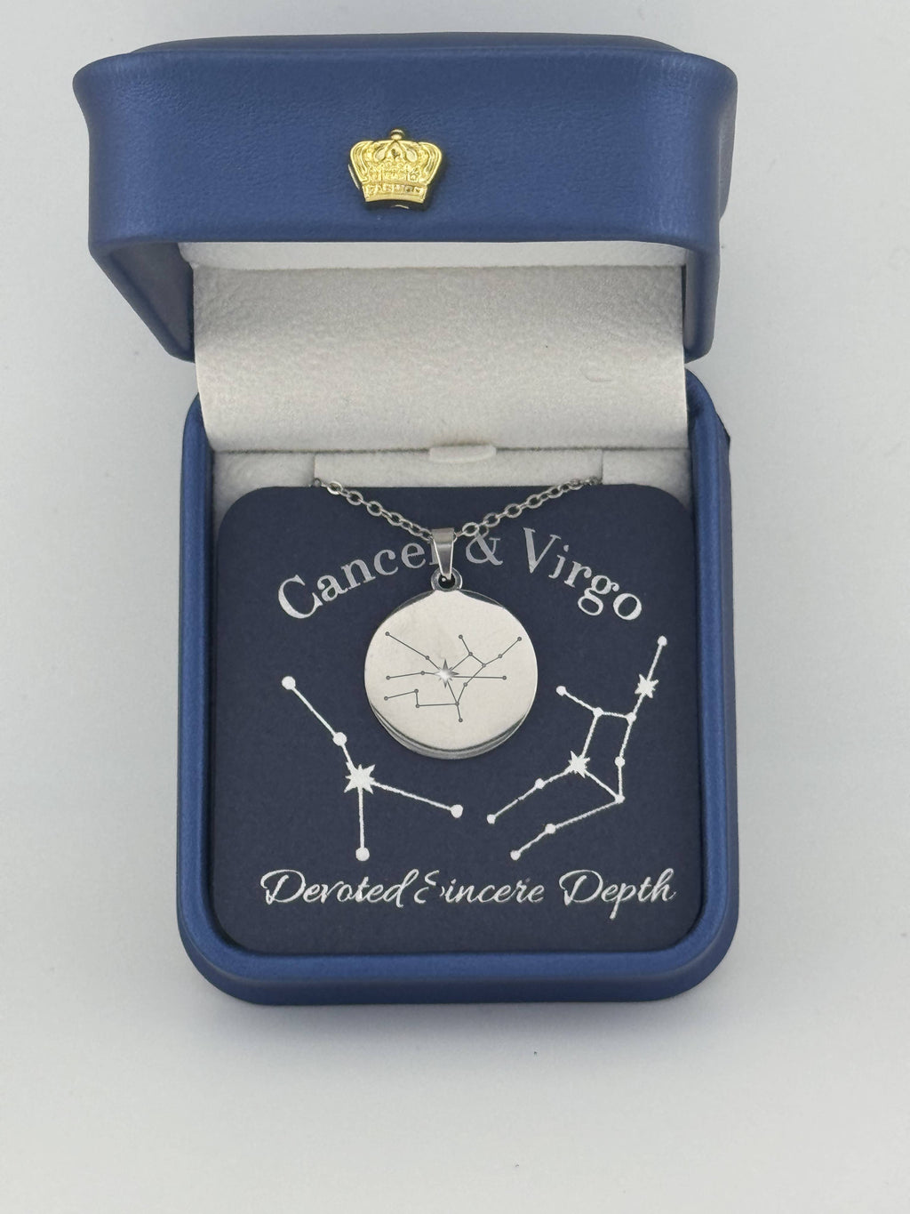 Silver Cancer and Virgo constellation medallion necklace in gift box with silver foil zodiac card
