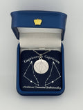 Silver Capricorn and Capricorn constellation medallion necklace in gift box with silver foil zodiac card
