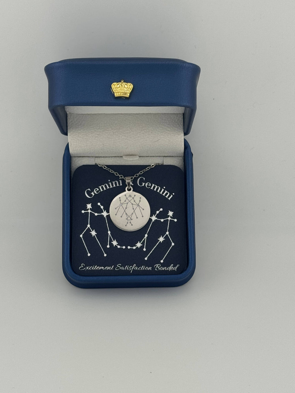 Silver Gemini + Gemini constellation medallion necklace in gift box with silver foil zodiac card