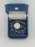 Silver Gemini + Sagittarius constellation medallion necklace in gift box with silver foil zodiac card
