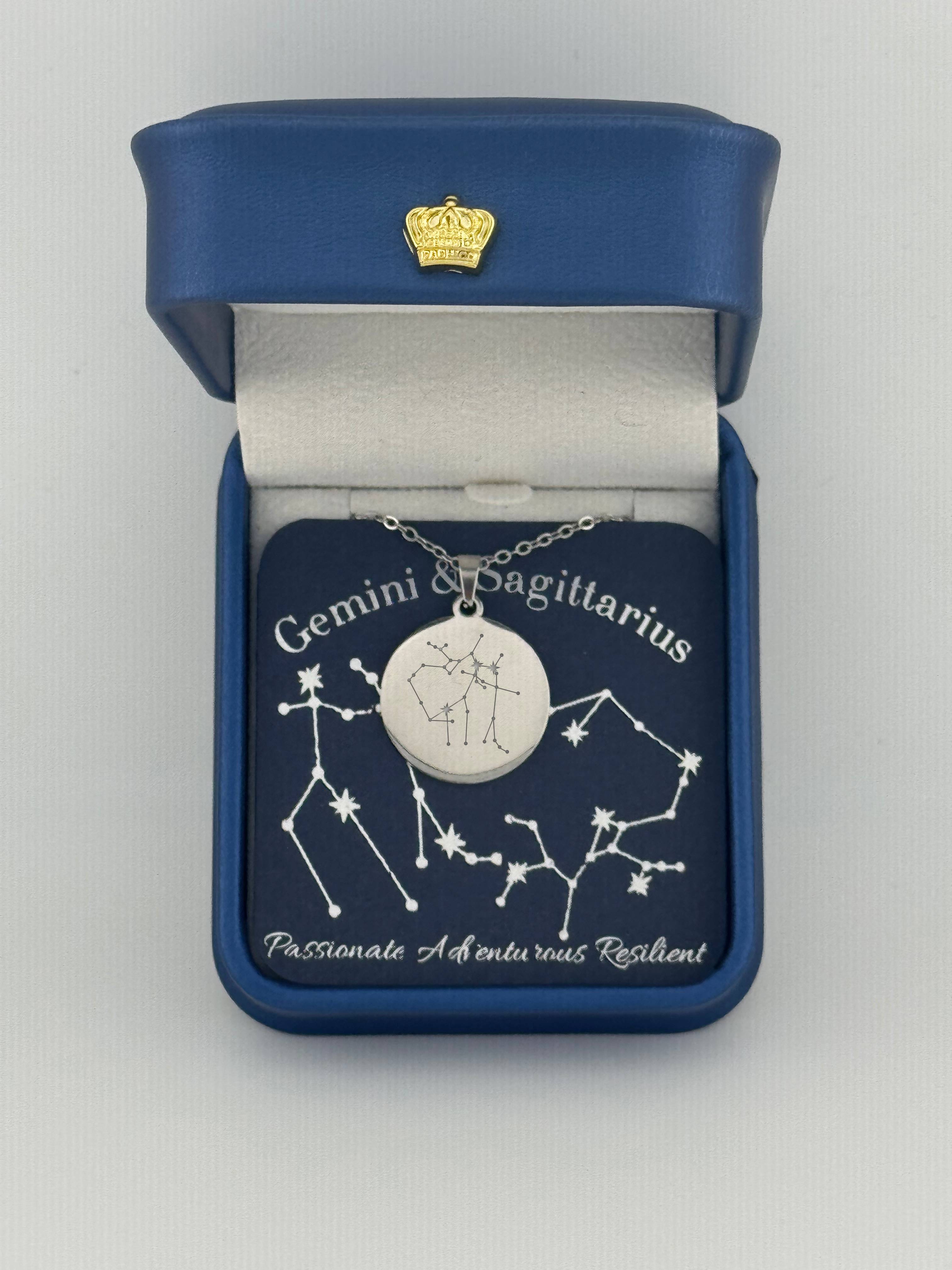 Silver Gemini + Sagittarius constellation medallion necklace in gift box with silver foil zodiac card
