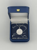 Silver Leo and Aquarius constellation medallion necklace in gift box with silver foil zodiac card
