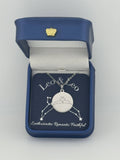 Silver Leo and Leo constellation medallion necklace in gift box with silver foil zodiac card
