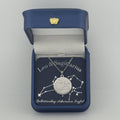 Silver Leo and Sagittarius constellation medallion necklace in gift box with silver foil zodiac card
