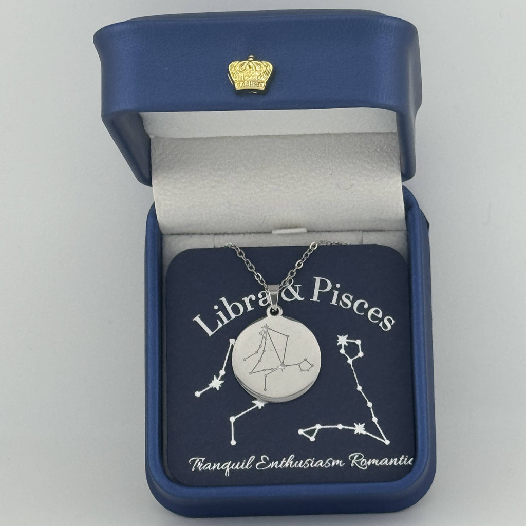 Silver Libra and Pisces constellation medallion necklace in gift box with silver foil zodiac card
