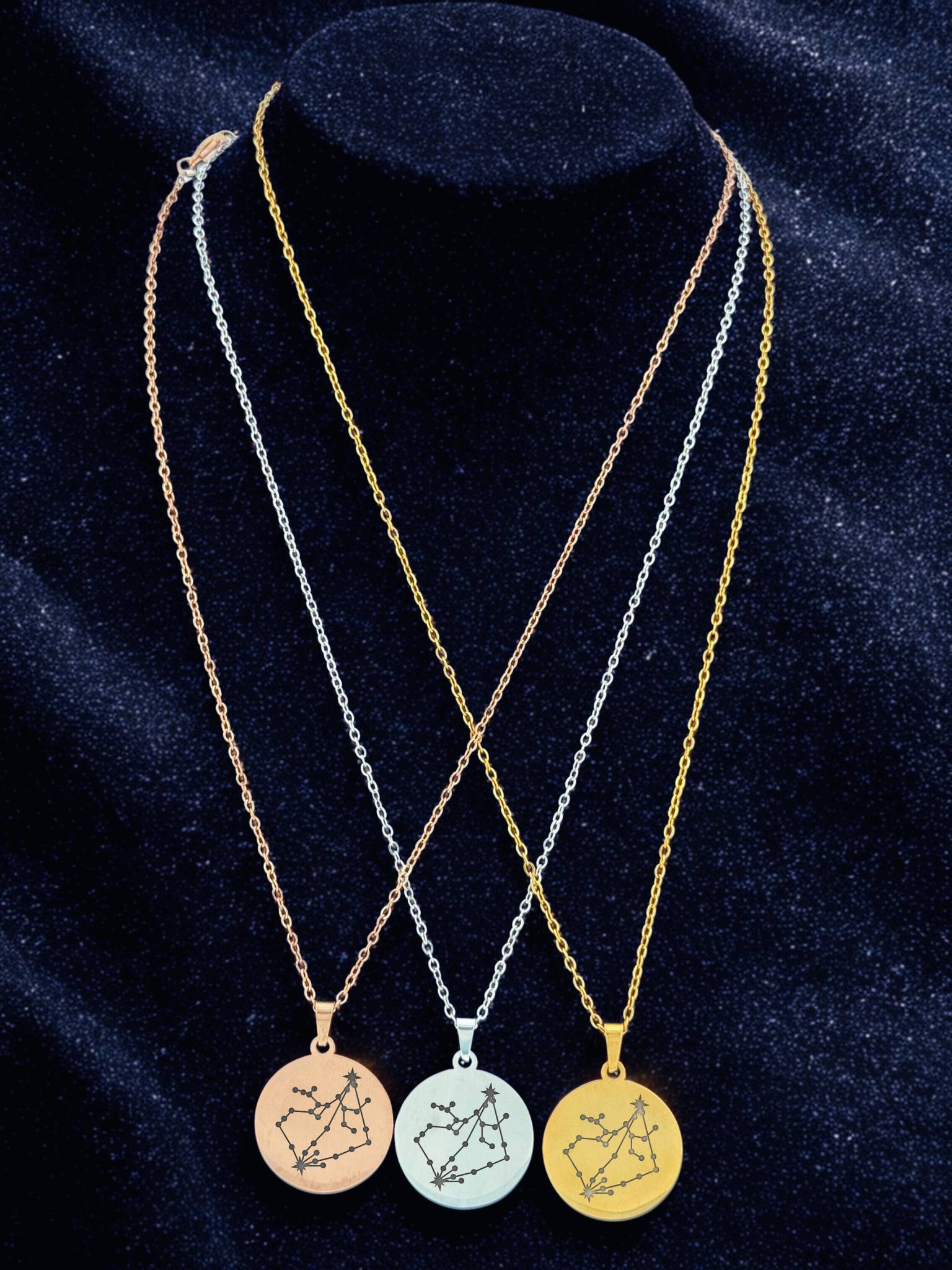 Sagittarius and Capricorn constellation medallion necklace in gold, silver, and rose gold finishes
