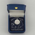 Silver Sagittarius and Capricorn constellation medallion necklace in gift box with silver foil zodiac card
