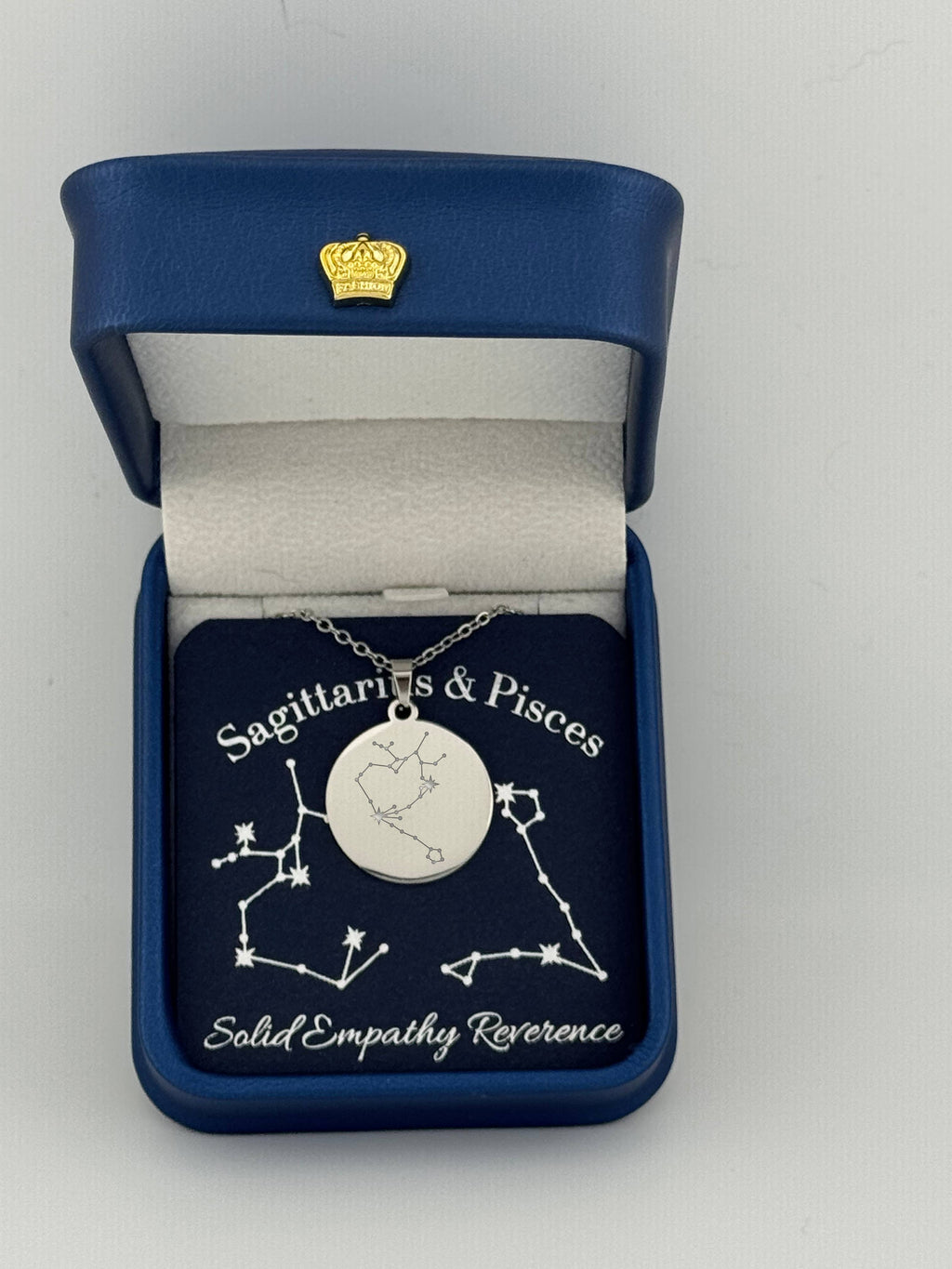 Silver Sagittarius and Pisces constellation medallion necklace in gift box with silver foil zodiac card

