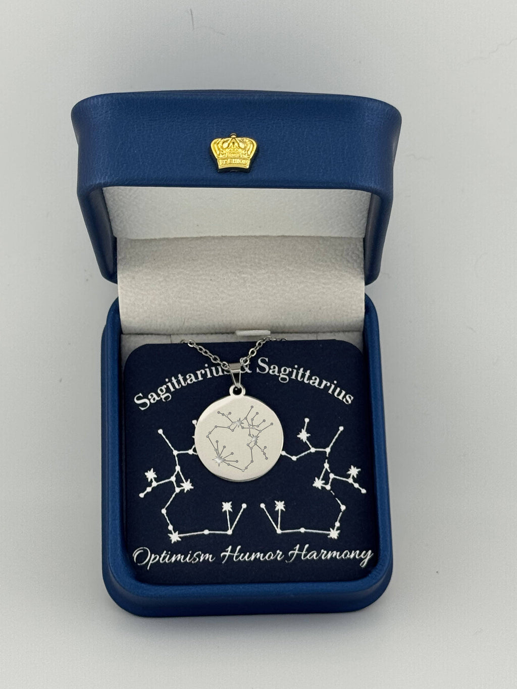 Silver Sagittarius and Sagittarius constellation medallion necklace in gift box with silver foil zodiac card
