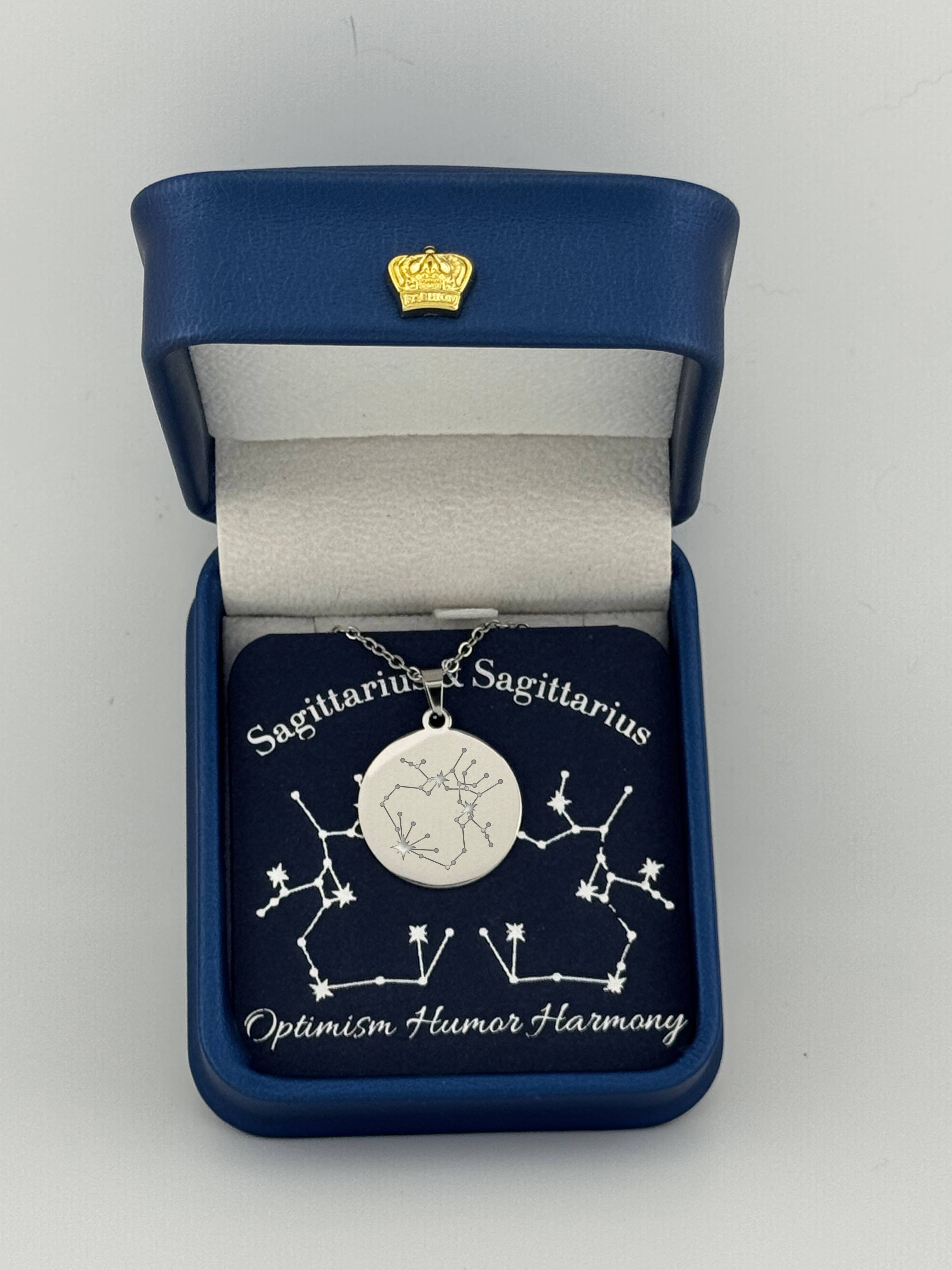 Silver Sagittarius and Sagittarius constellation medallion necklace in gift box with silver foil zodiac card
