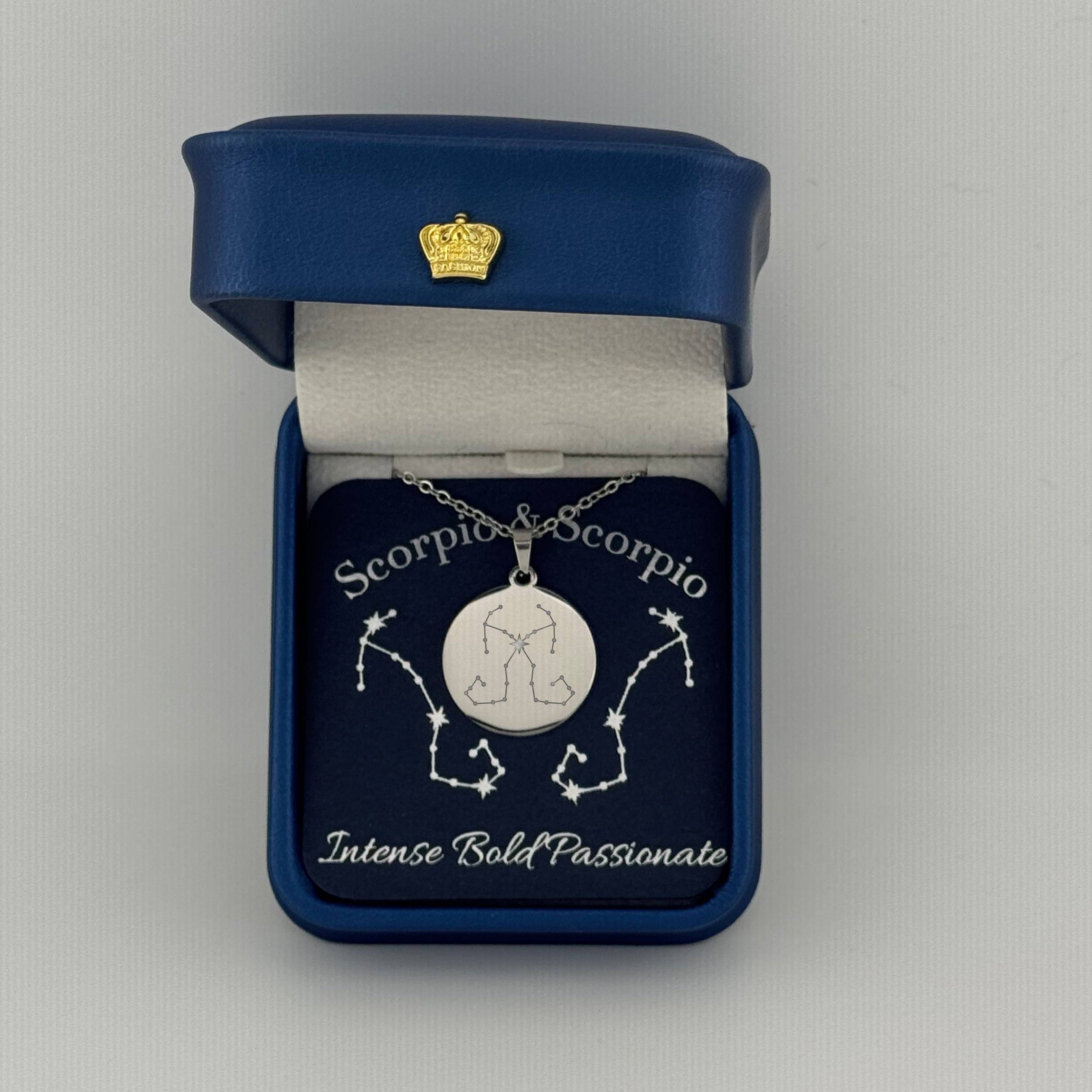 Silver Scorpio and Scorpio constellation medallion necklace in gift box with silver foil zodiac card
