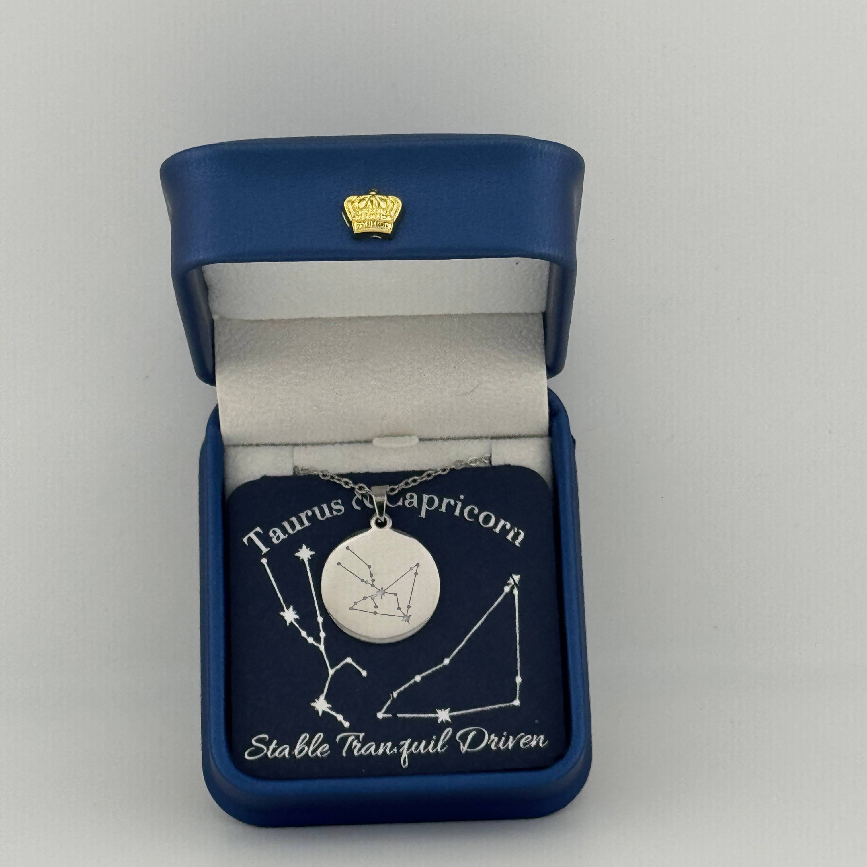 Silver Taurus + Capricorn  constellation medallion necklace in gift box with silver foil zodiac 