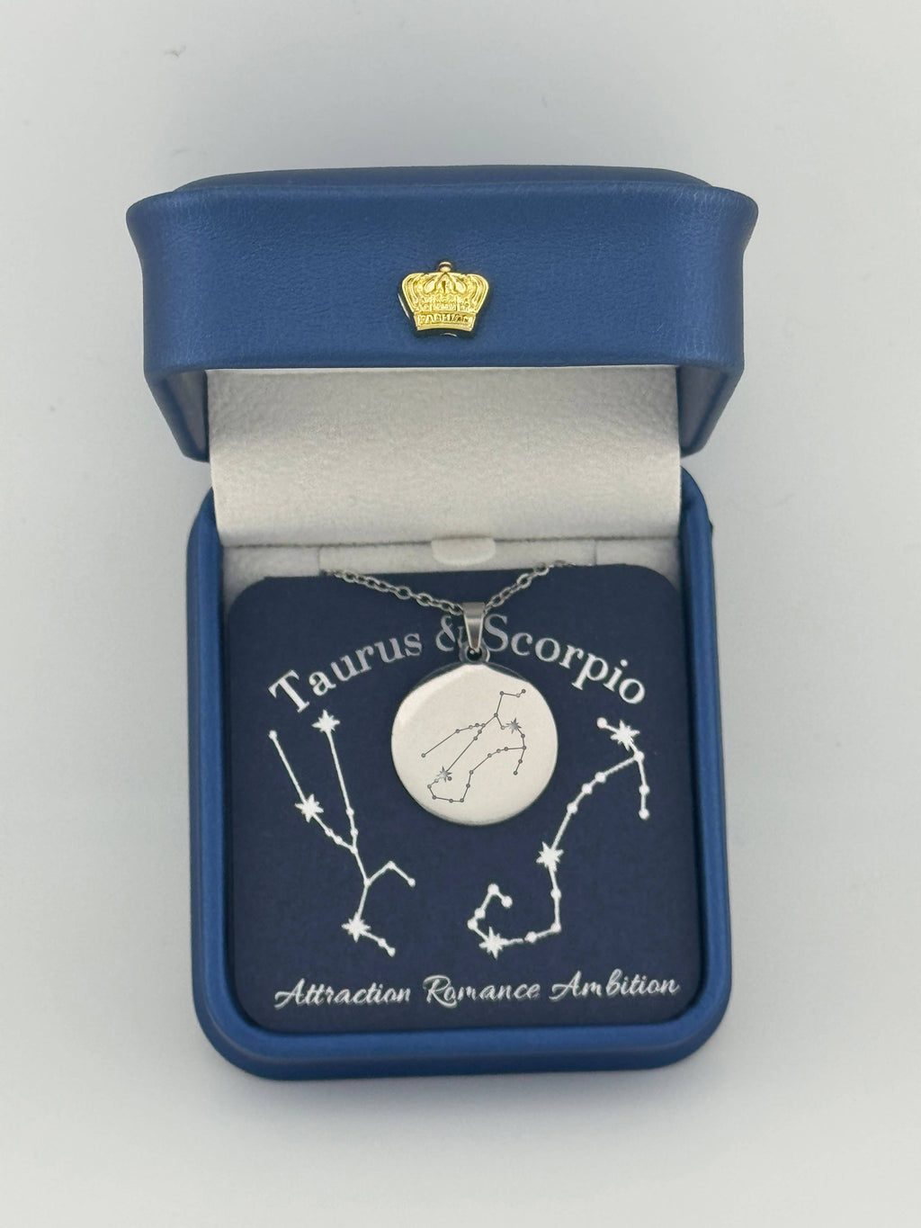 Silver Taurus+ Scorpio constellation medallion necklace in gift box with silver foil zodiac card
