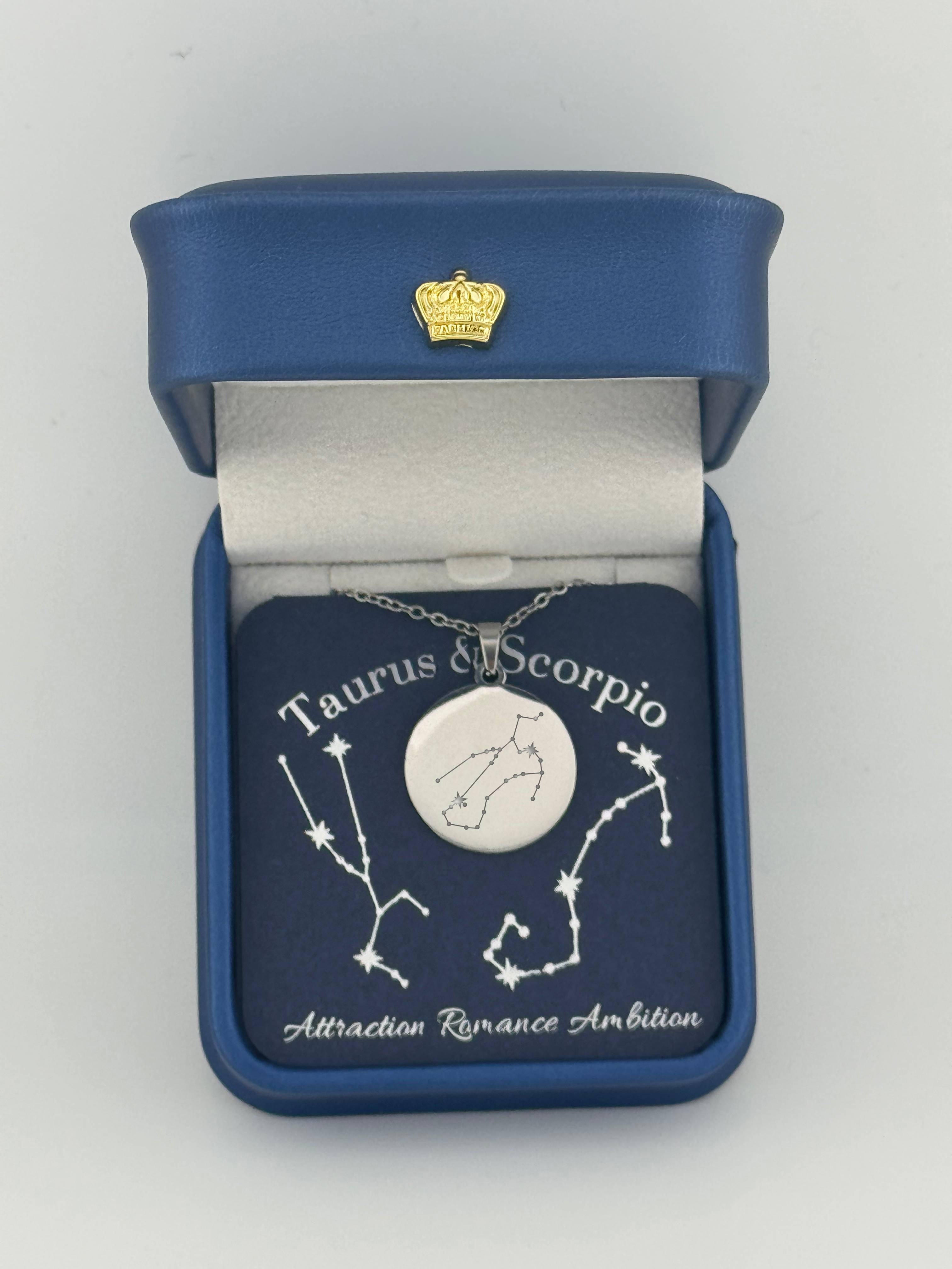 Silver Taurus+ Scorpio constellation medallion necklace in gift box with silver foil zodiac card
