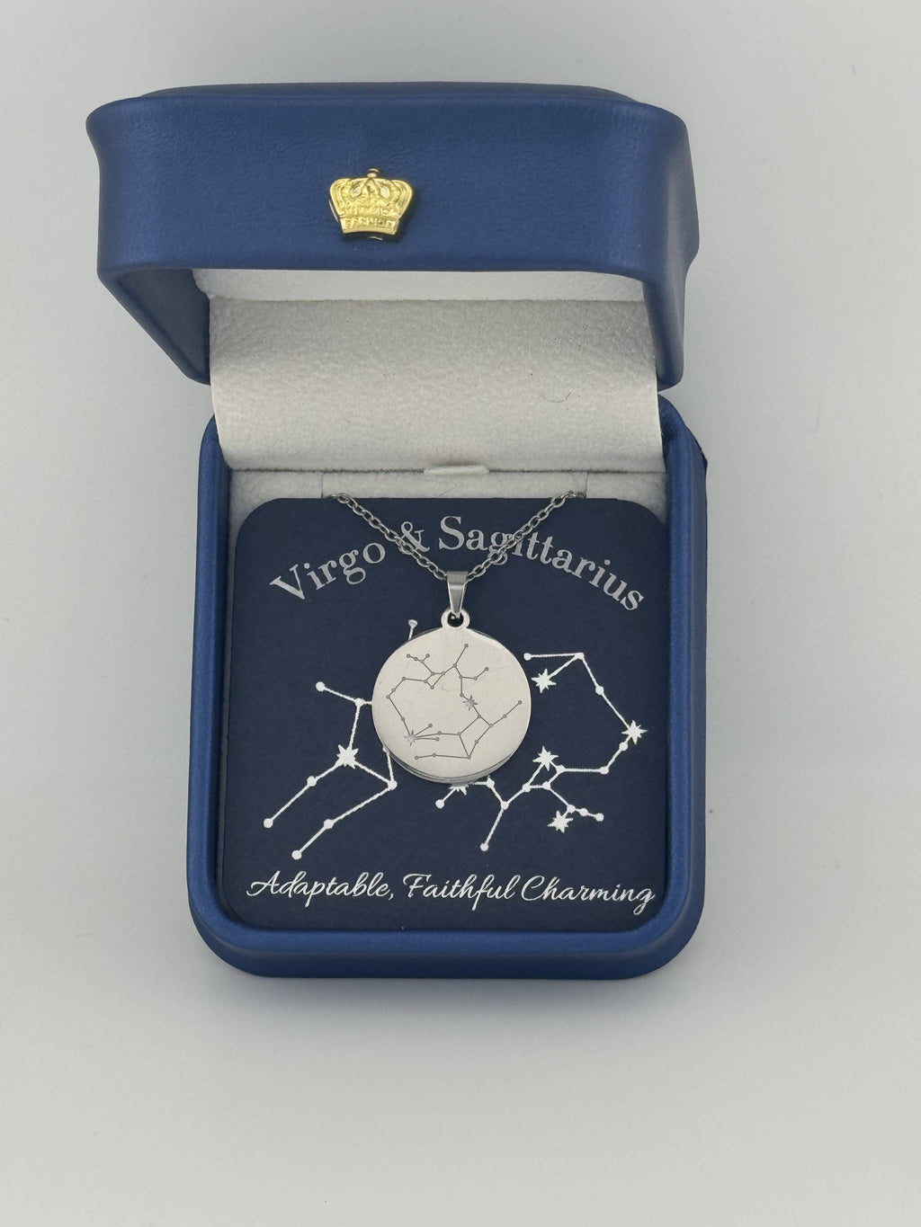 Silver Virgo and Sagittarius constellation medallion necklace in gift box with silver foil zodiac card
