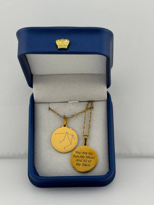 Gold Aries + Libra zodiac medallion necklaces, one with constellation and one with custom engraved message 'you are my sun, my moon, and all of my stars'
