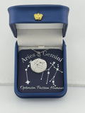 Silver Aries + Gemini constellation medallion necklace in gift box with silver foil zodiac card"
